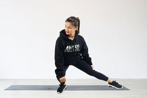 The 5 Best Lower Body Workouts You Can Do At Home | Lorelyn Salac wearing Awtsu Pullover Hoodie doing lateral lunges